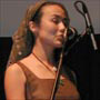 ( Jasmine sings for the Otakon Crowd. )