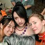 Three spectacular costumes, complete with contacts, look upwards to the sky for the camera.
